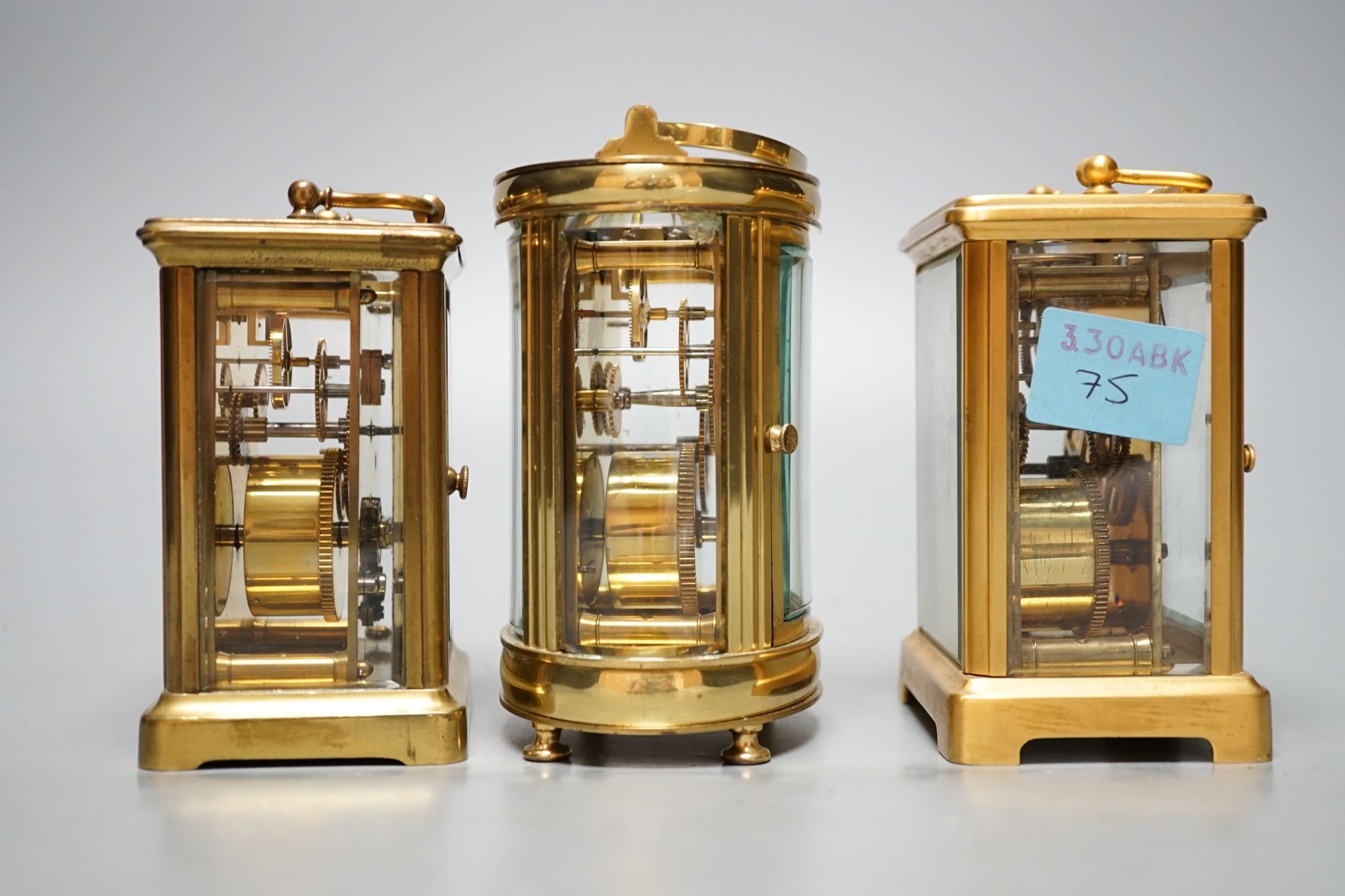 Three carriage timepieces, tallest 12 cm